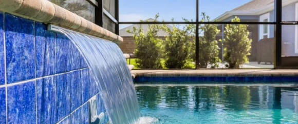 Waterfall spilling into pool