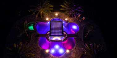 Drone shot of winter park pool with LED lights in the pool