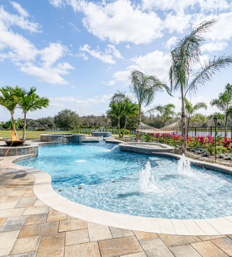 Freeform pools in florida with water fountain feature