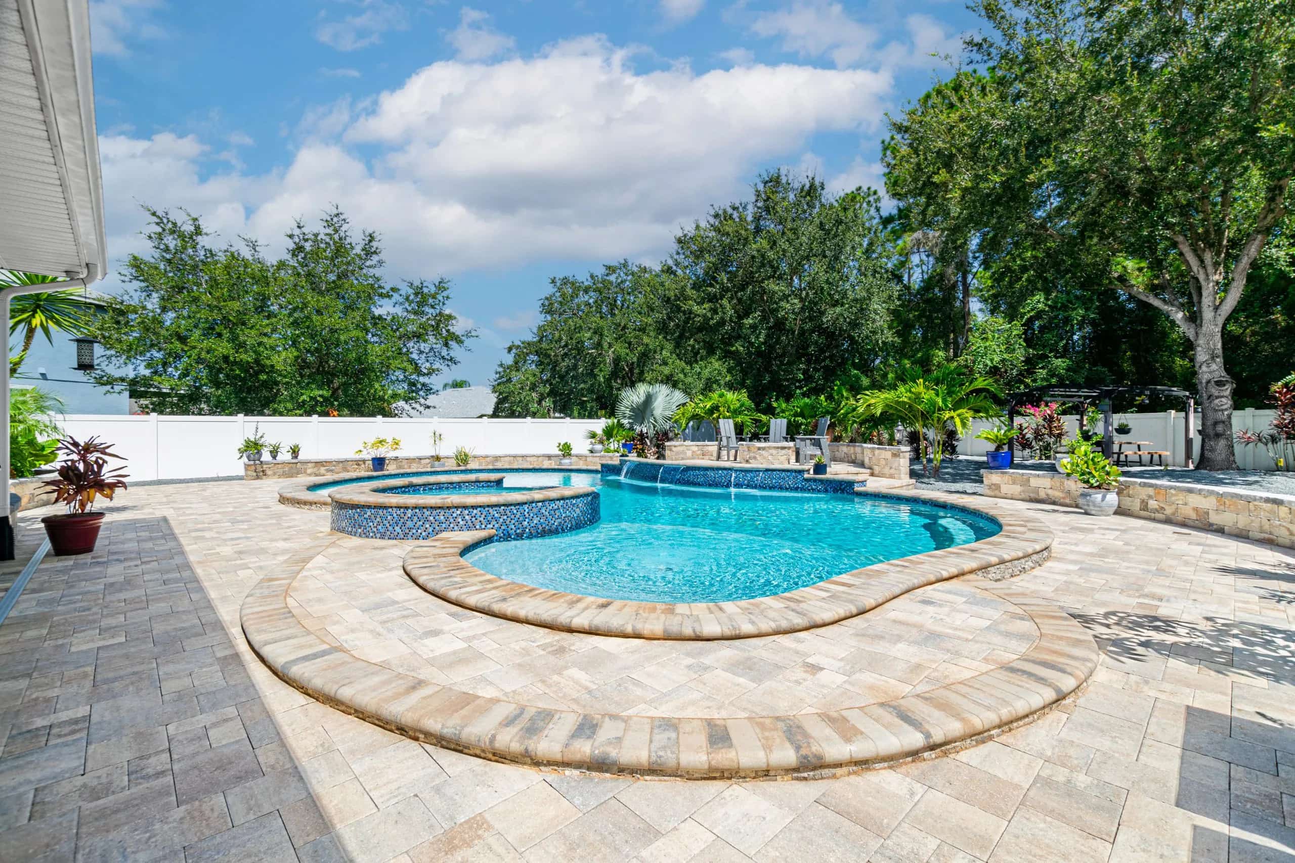 Freeform pool with spa in florida