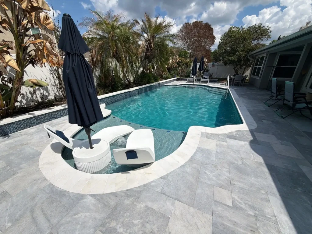 A new sun shelf is What is Included in a Pool Renovation in Orlando