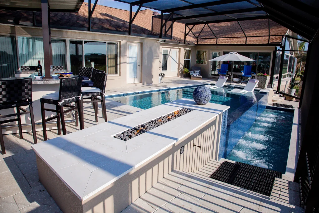 How much does a pool renovation cost including fire feature and spill pool