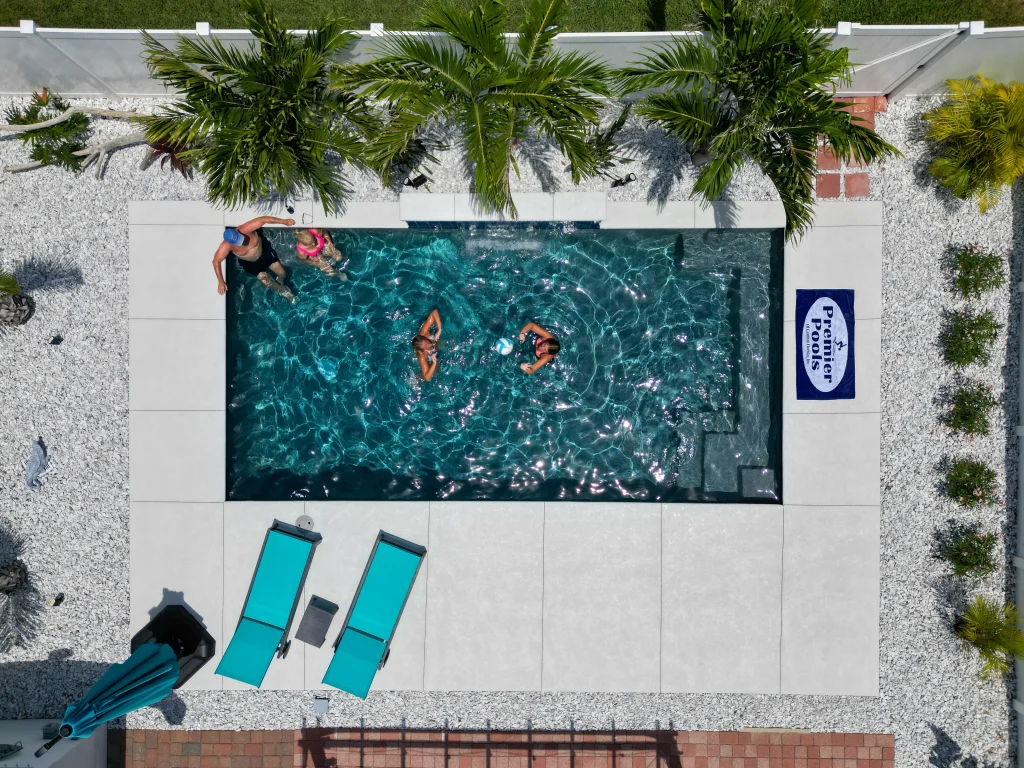Family enjoying their new pool construction in Florida