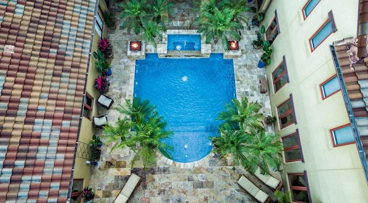 Aerial shot of the geometric pool in orlando with fire features and hot tub