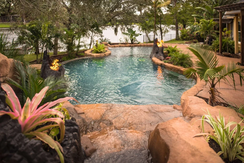 Pool with faux rocks and a waterfall in Merritt Island after a Pool renovation